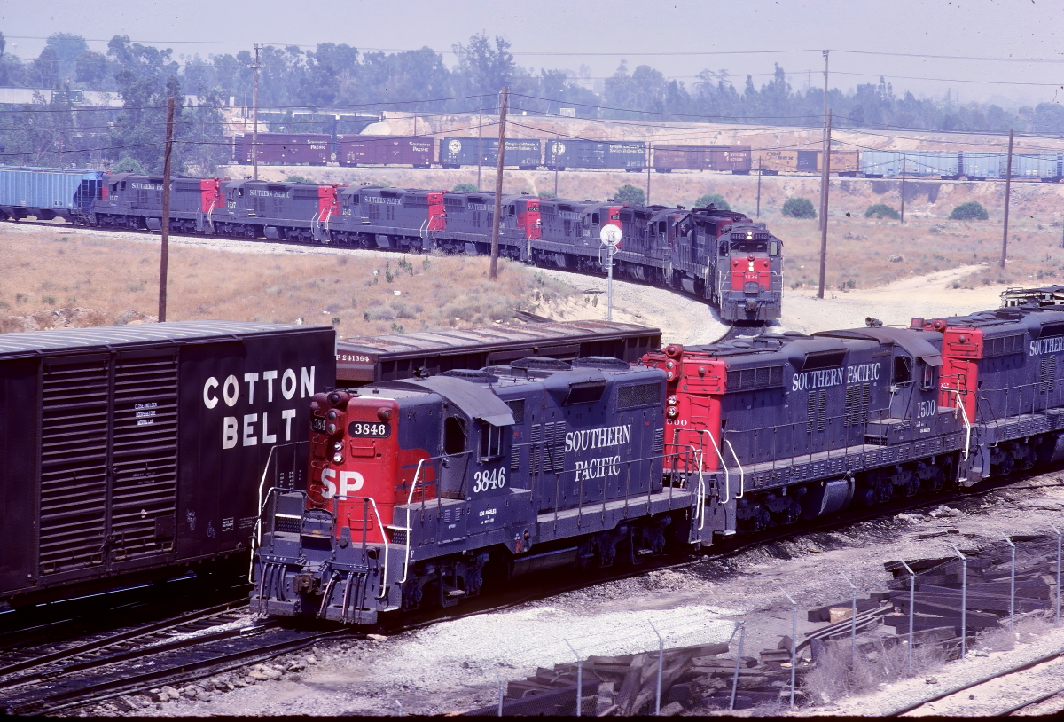 SP 3846 is a class EMD GP9R,  and  is pictured in West Colton, California, USA.  This was taken along the Los Angeles/SP on the Southern Pacific Transportation Company. Photo Copyright: Rick Doughty uploaded to Railroad Gallery on 03/26/2024. This photograph of SP 3846 was taken on Saturday, June 08, 1985. All Rights Reserved. 